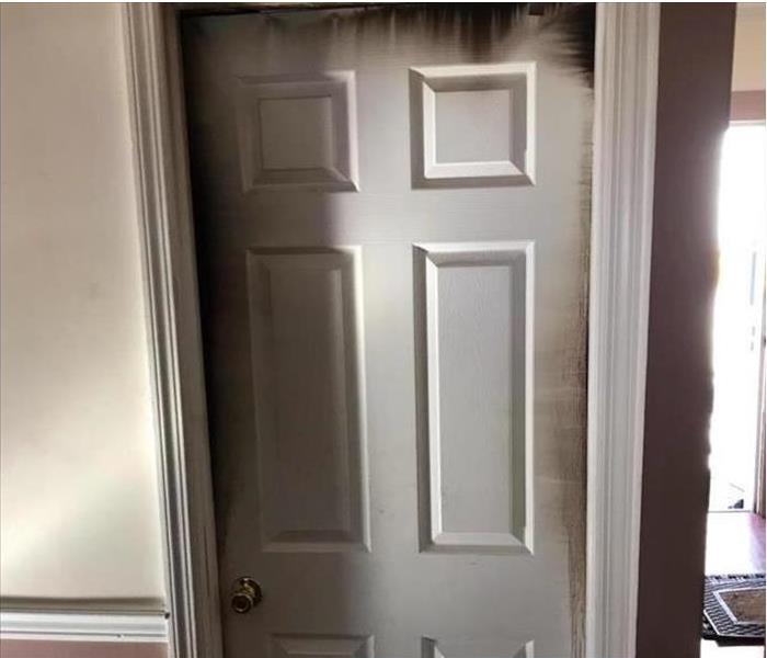 Image shows how important keeping your door shut can be in case of a house fire. 