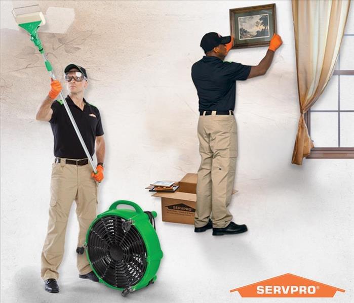 this image shows a SERVPRO team cleaning and sanitizing after a fire