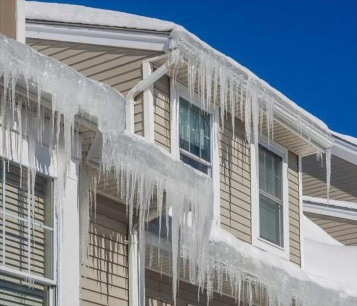 Numerous ice dams formed on the edge on a roof
